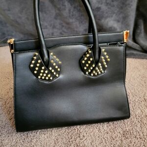 Black handbag with studs